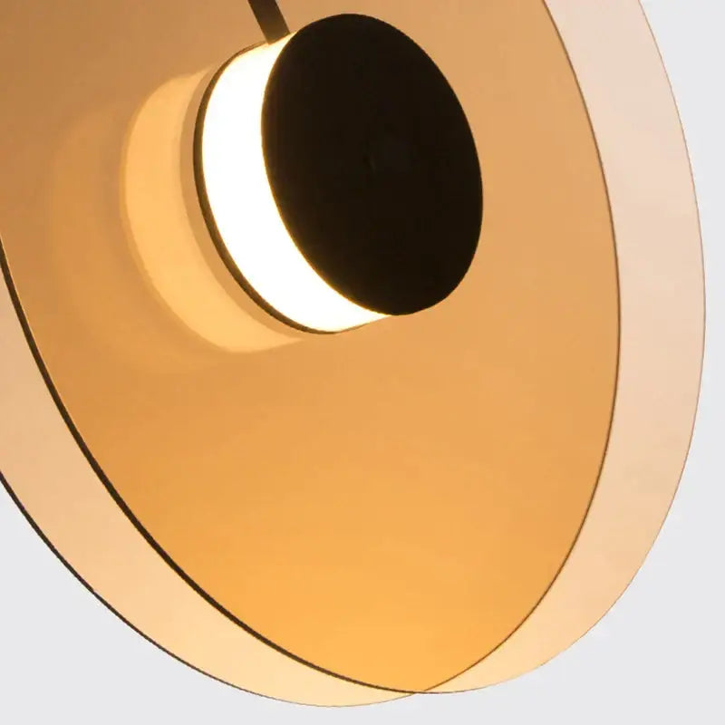 Modern amber smoke gray glass pendant lamp with warm-toned circular amber smoke glass shades for dining room decorbites