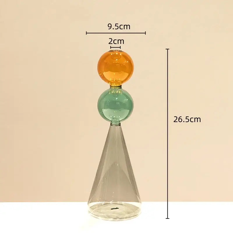 A modern stained glass vase with double glazing featuring amber and teal orbs on a clear conical base for living room decor