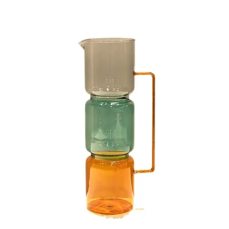 A modern three-tiered stained glass pitcher with double glazing in amber teal and gray for living room decor