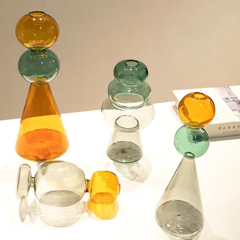 Modern amber and teal double glazing stained glass vase featuring vibrant stacked translucent spheres on conical bases