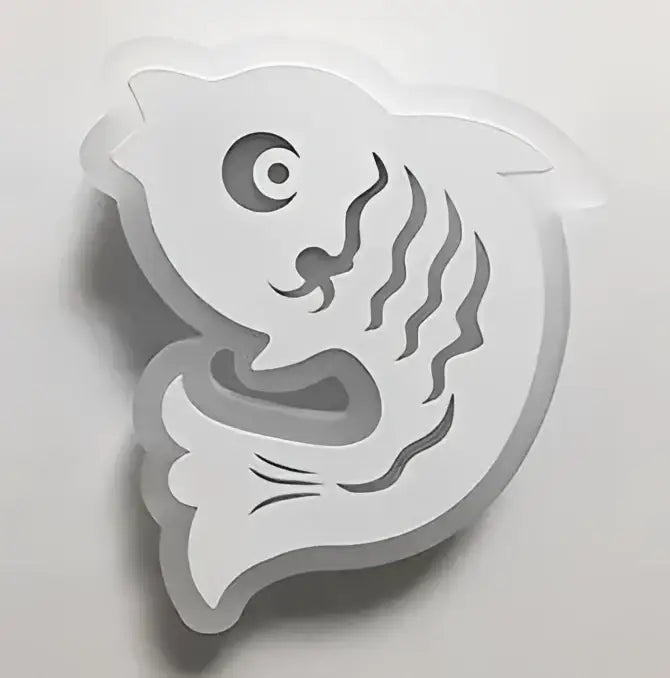 White plastic fish-shaped kids led wall light with stylized cut-out detailing for modern bedroom decorbites decorbites kids led