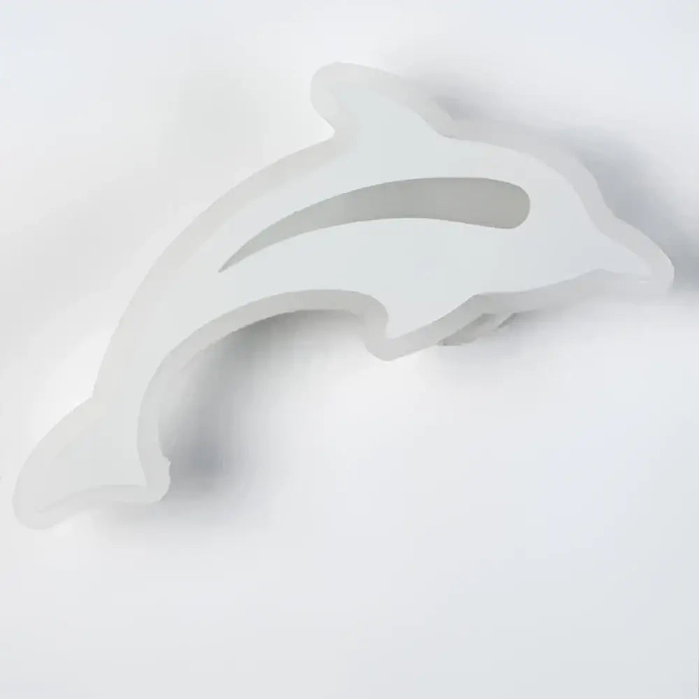 White plastic dolphin-shaped cookie cutter shown with modern animal acrylic kids led wall light decorbites kids led wall light