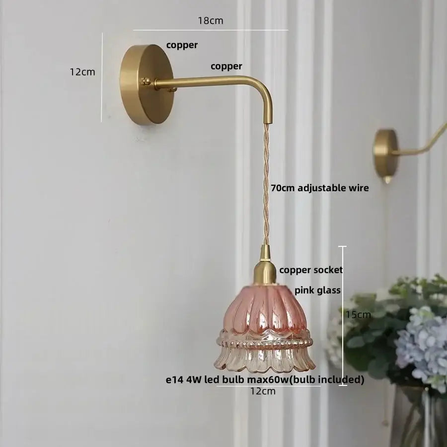 Modern antique brass amber glass led wall light featuring a delicate pink glass lampshade with fluted design by decorbites amber glass