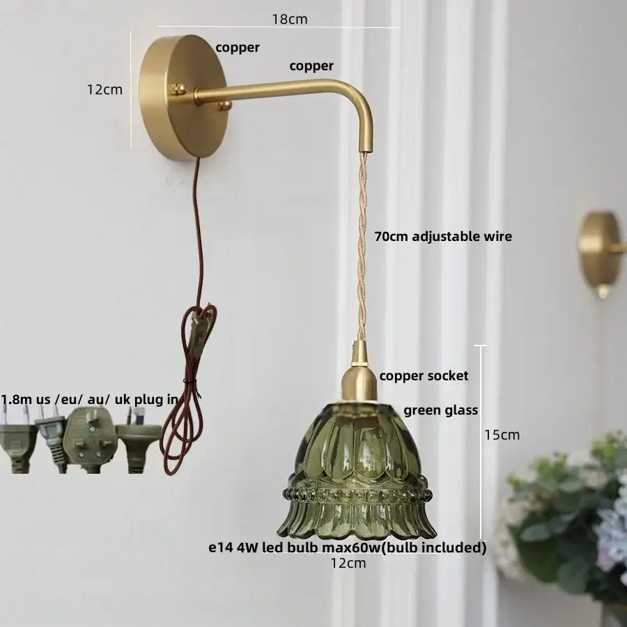 A vintage-style wall light with brass copper finish, green amber glass led shade, and adjustable 70cm wire for decorbites