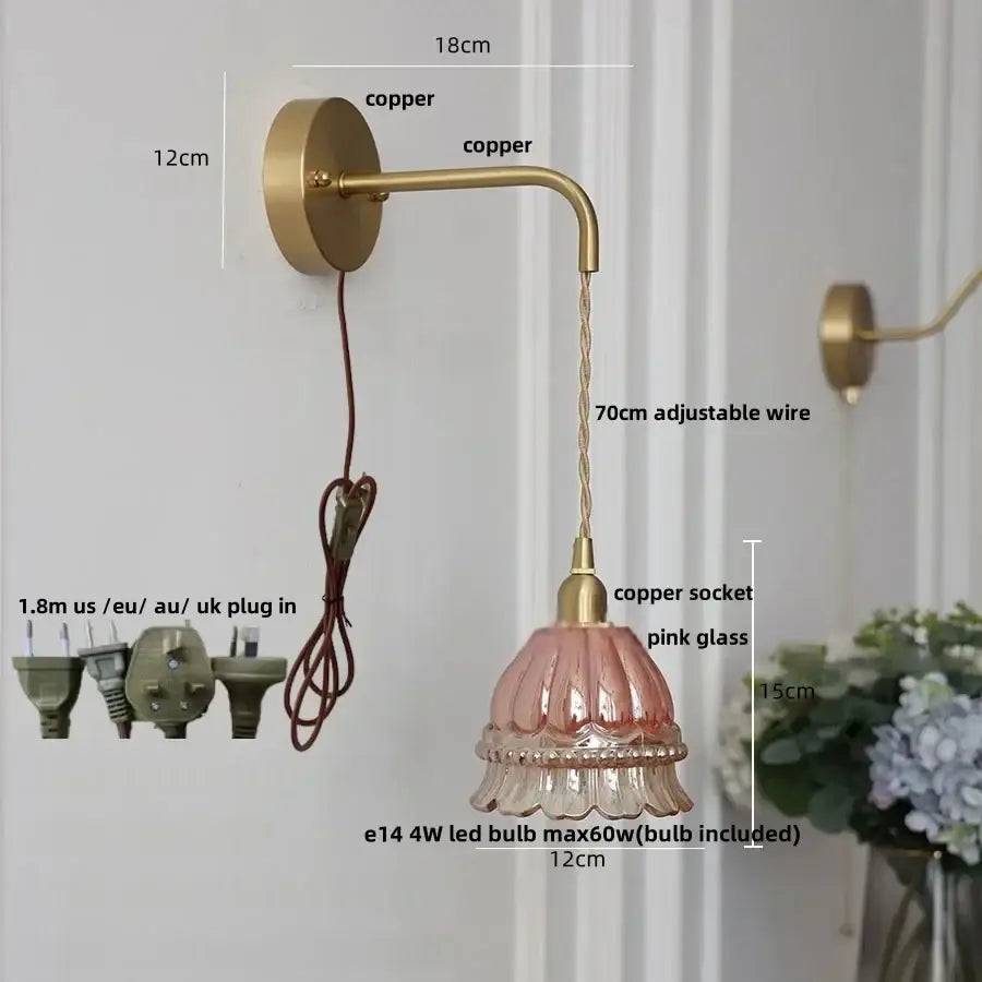 Modern antique brass amber glass led wall light with a delicate pink fluted glass shade on an adjustable copper arm by decorbites amber glass
