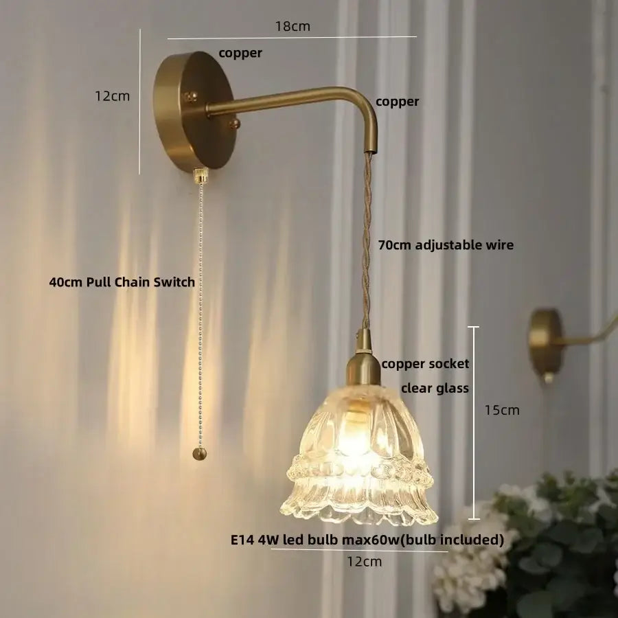 Antique brass wall light with clear fluted glass shade and adjustable 70cm wire featuring decorbites amber glass led design