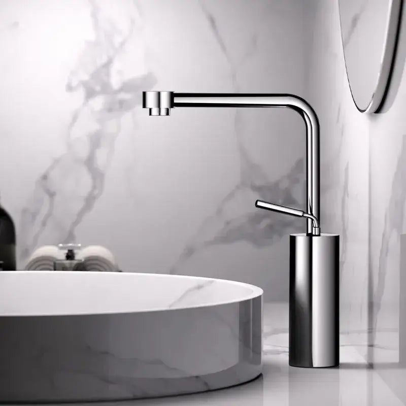 Modern antique bronze curved brass faucet with chrome finish and minimalist cylindrical base for bathroom use
