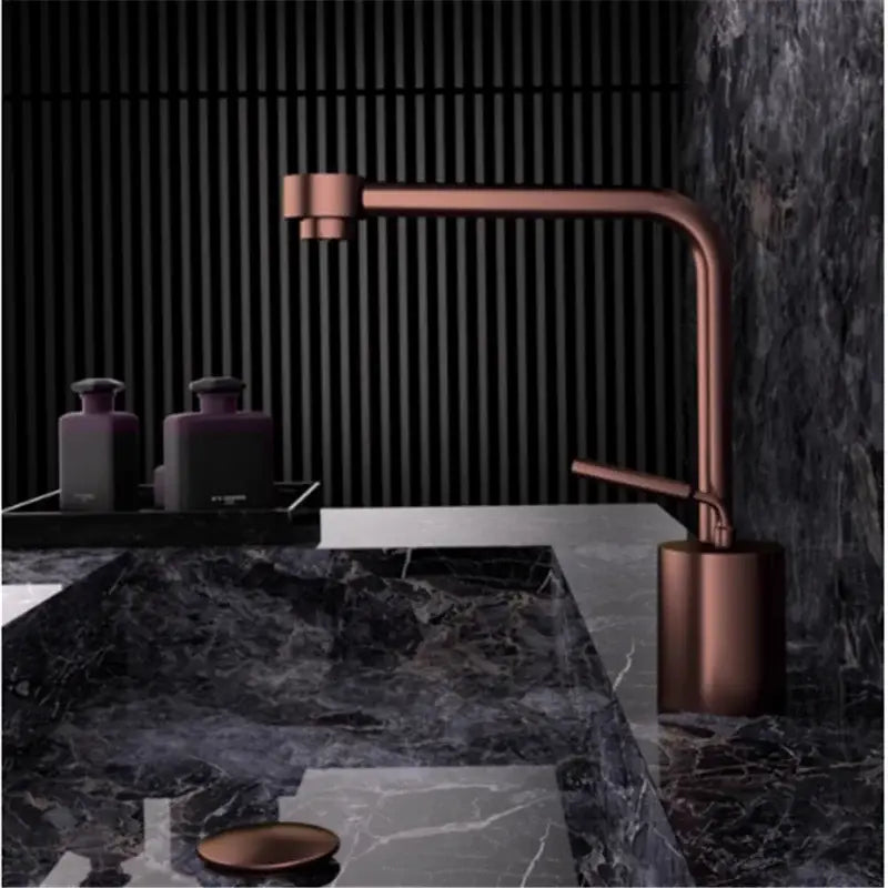 Modern antique bronze curved brass faucet with copper finish and sleek minimalist design for bathroom use