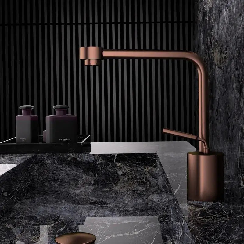 Modern antique bronze curved brass faucet with copper finish and sleek curved spout for bathroom use