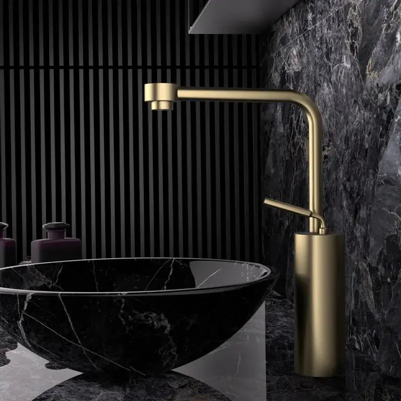 Modern antique bronze curved brass waterfall faucet with sleek spout and cylindrical base for bathroom fixtures