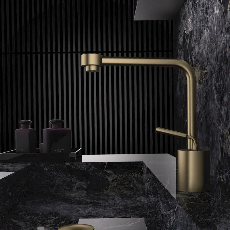 Modern antique bronze curved brass faucet with gold-toned brushed metal finish for bathroom fixture
