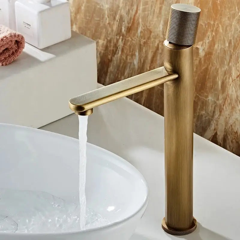 Modern antique bronze single handle bathroom faucet with textured cylindrical knob for cold water use