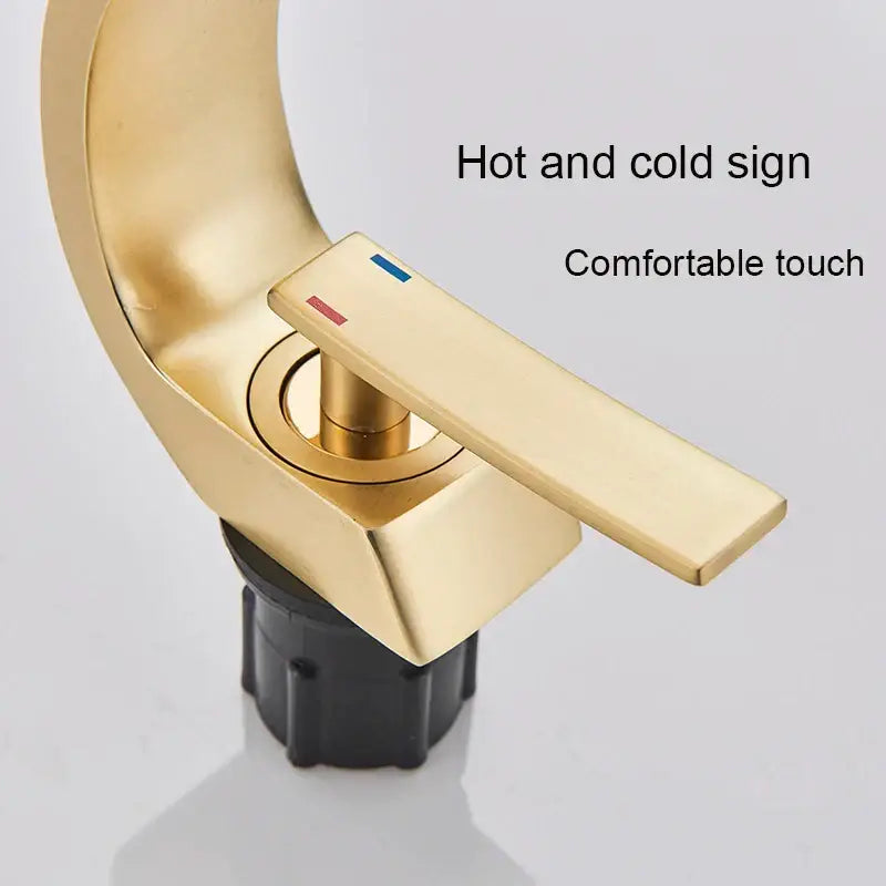 Modern arched brushed gold basin faucet bathroom mixer with sleek curved spout and rectangular handle with hot cold indicators