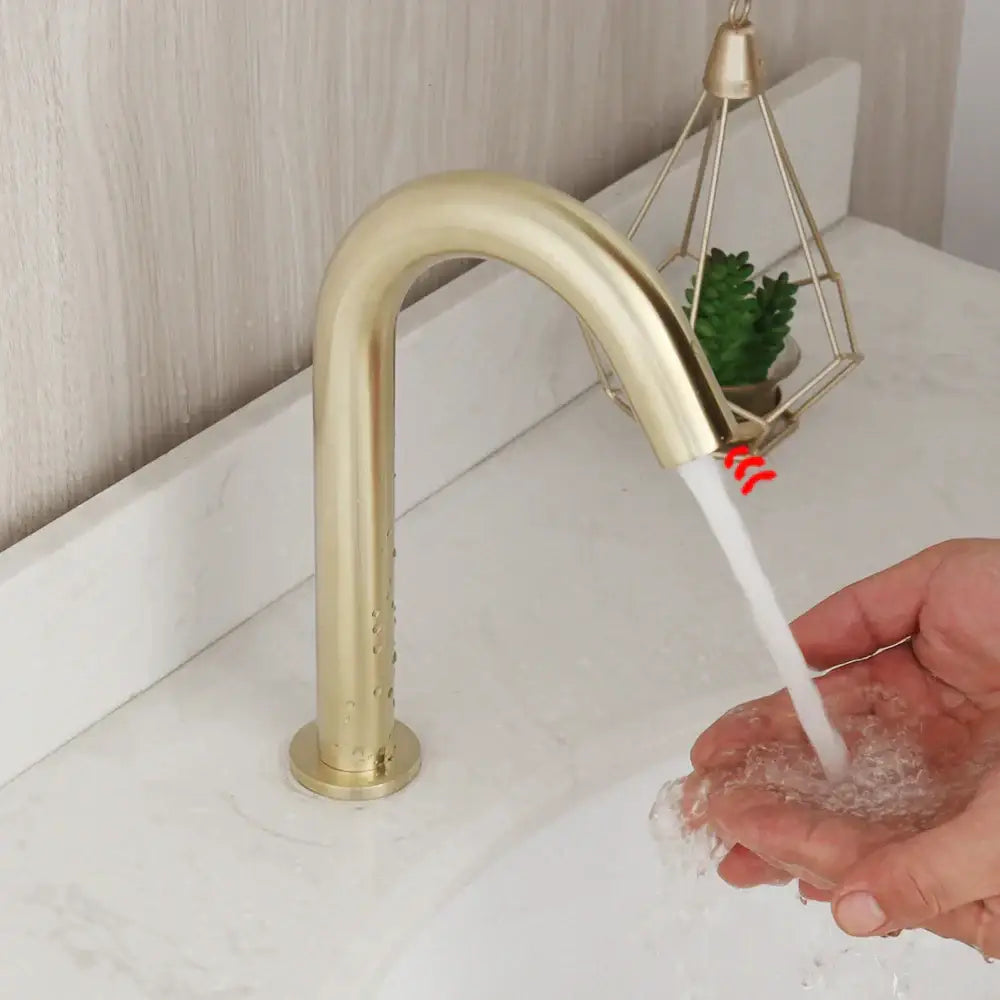 Modern arched brushed gold basin faucet with a brass-finished single-handle and sleek curved spout from decorbites brushed gold