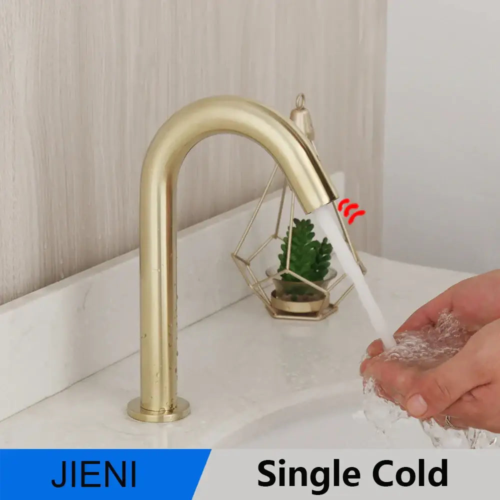 Modern arched brushed gold sensor basin faucet with single-handle and sleek curved spout from decorbites brushed gold collection