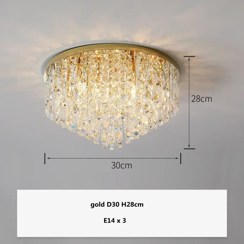 Modern art deco gold crystal steel led ceiling chandelier with cascading clear and gold-toned crystals 30cm diameter decorbites crystal steel
