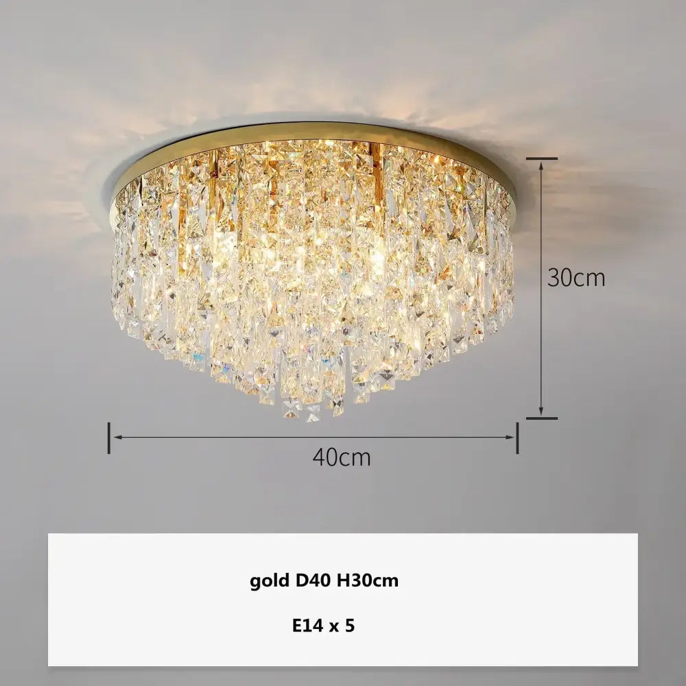 Modern art deco gold crystal steel led ceiling chandelier with cascading clear prisms for dining room decorbites crystal steel