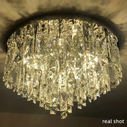 Modern art deco gold crystal steel led ceiling chandelier with cascading faceted prisms for dining room decorbites crystal steel