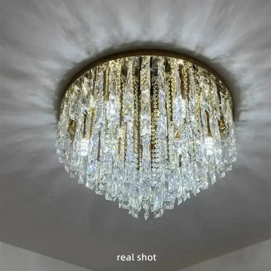 Modern art deco gold crystal steel led ceiling chandelier with cascading clear prisms for dining room decorbites crystal steel
