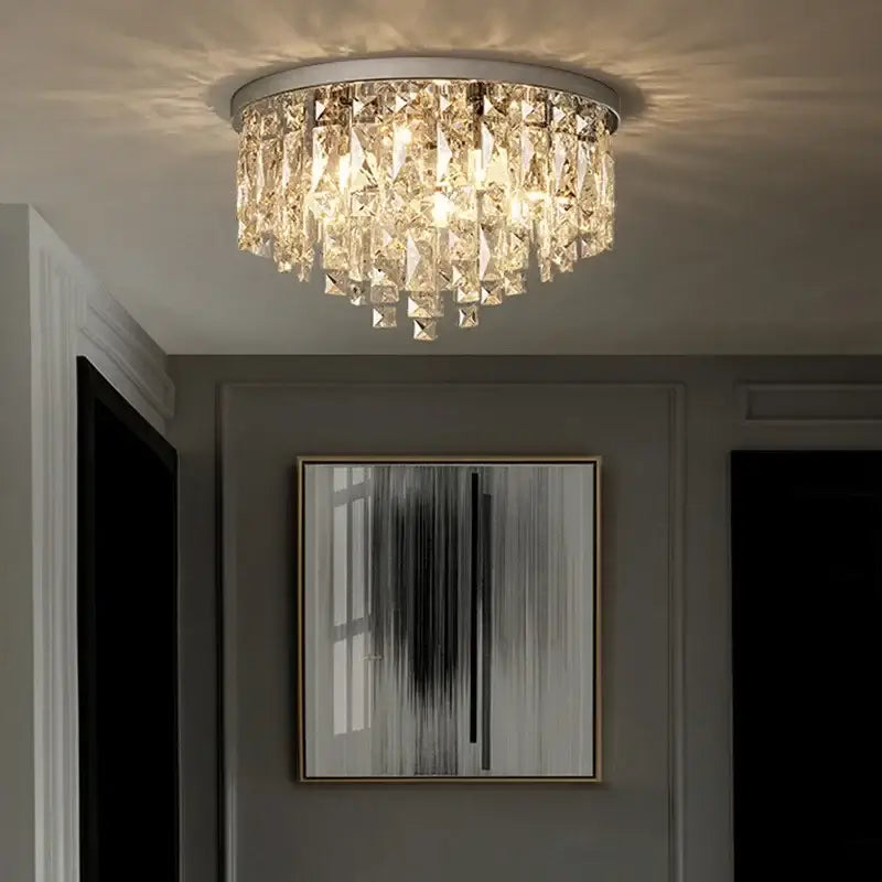 Modern art deco gold crystal steel led ceiling chandelier with silver frame and faceted prisms for dining room decorbites crystal steel