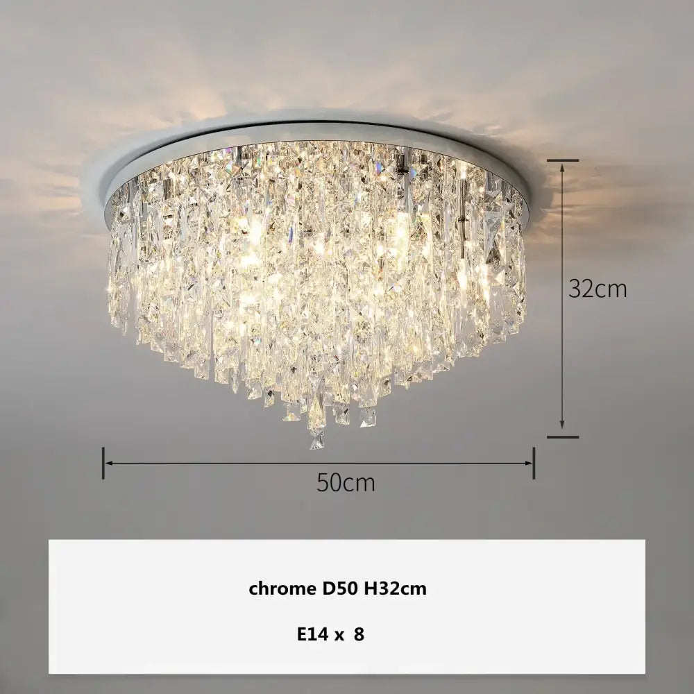 Modern art deco gold crystal steel led ceiling chandelier with chrome finish and cascading clear glass prisms for dining room decorbites crystal steel