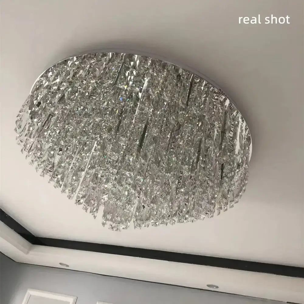 Modern art deco gold crystal steel led ceiling chandelier with cascading clear glass prisms by decorbites crystal steel