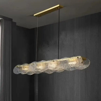 Modern art glass dining table chandelier with textured translucent glass and gold-toned metal decorbites art glass lighting