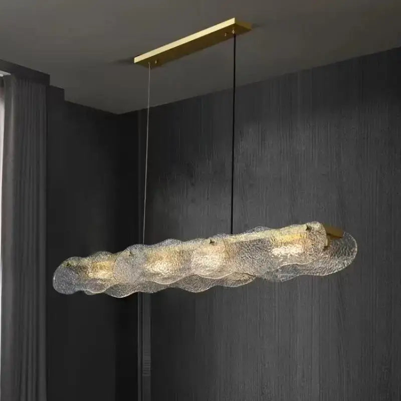 Modern art glass dining table chandelier with textured translucent glass and gold-toned metal decorbites art glass lighting