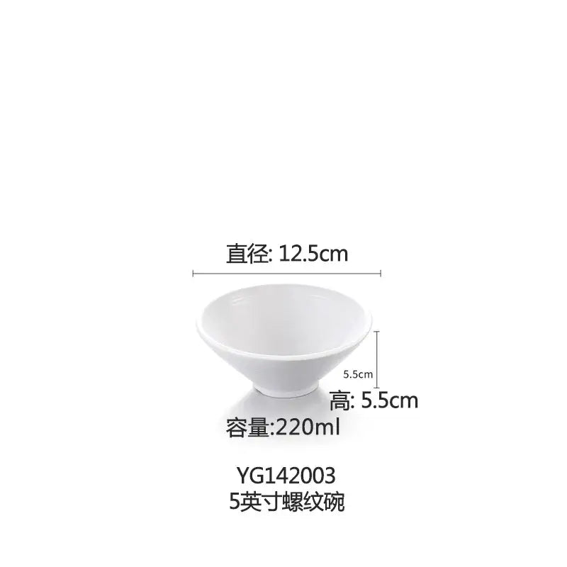 White ceramic bowl with textured surface and flared rim alongside decorbites black melamine plastic dipping sauce bowls