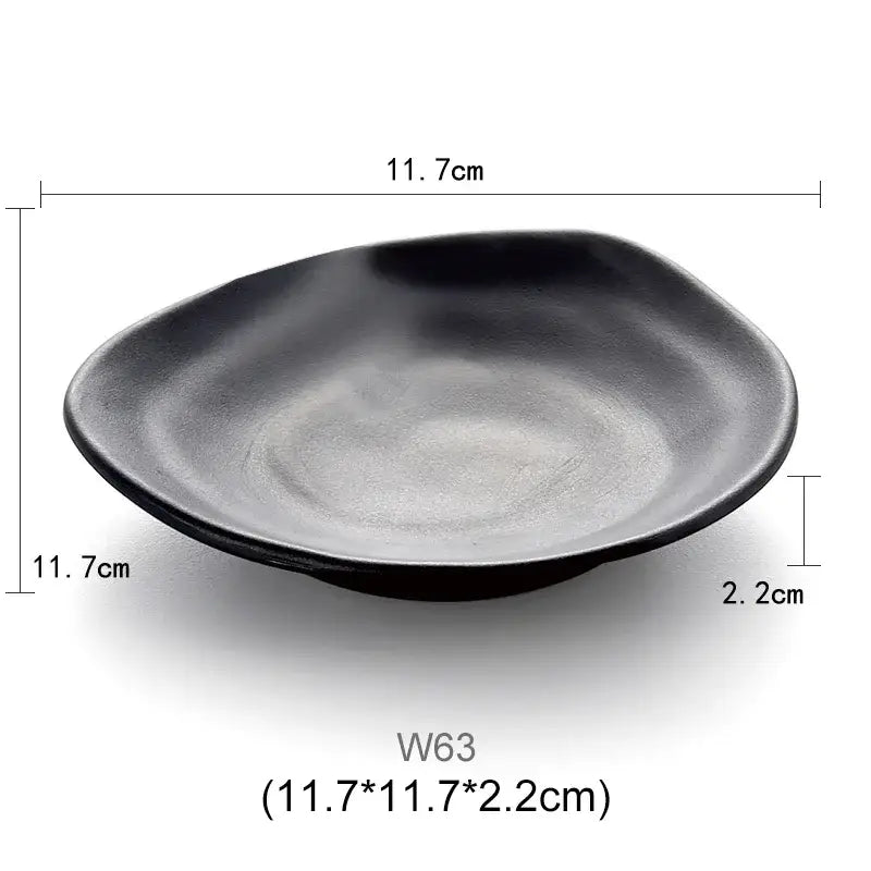 Modern asymmetrical black melamine plastic dipping sauce bowl with smooth glossy finish and organic edges decorbites black melamine