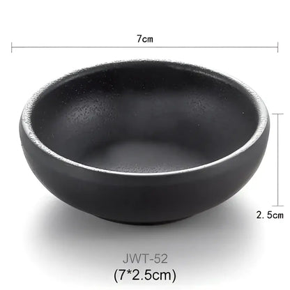 Black ceramic dipping sauce bowl with matte finish and rounded edges in decorbites black melamine plastic style