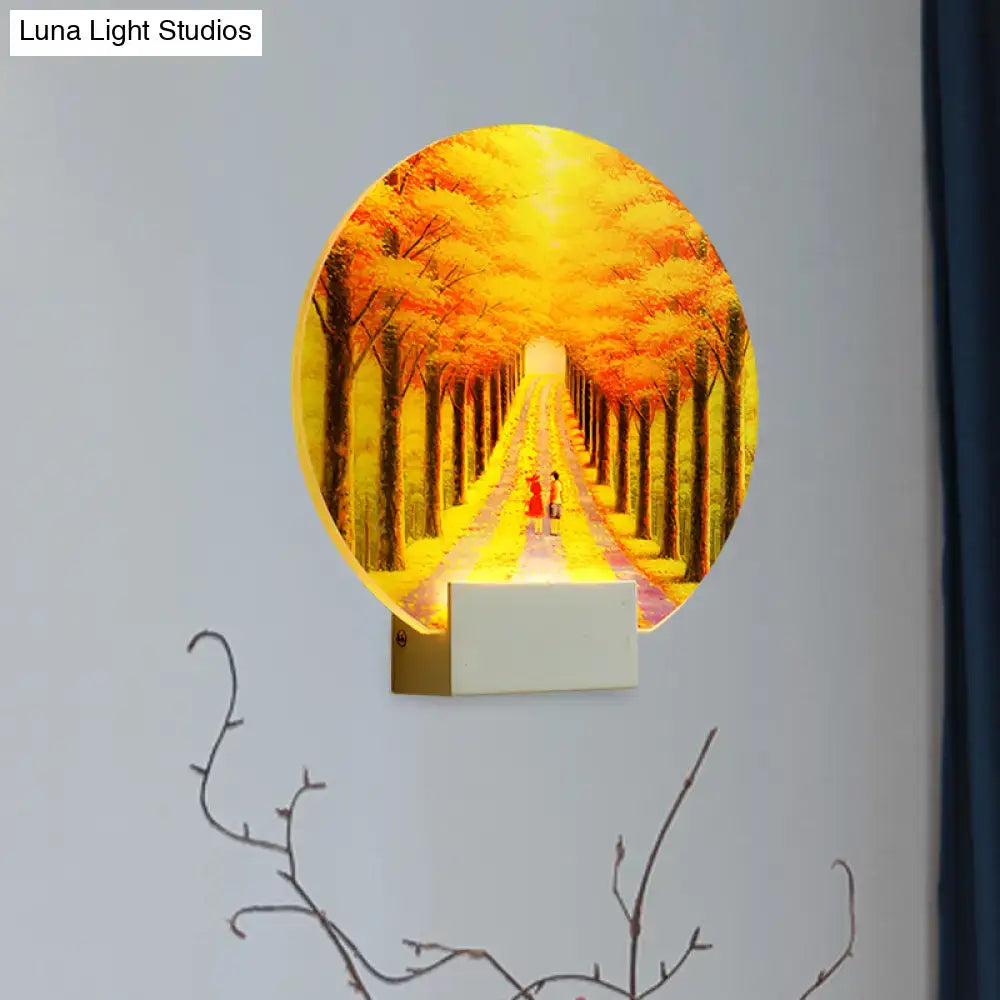 Modern autumn forest acrylic wall lamp with glowing yellow orange hues and fixture height 12in for living room use