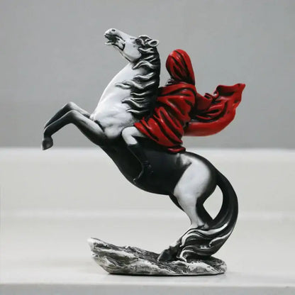 A modern red knight statue featuring a dynamic black and white horse with a flowing red cloak made of glossy resin