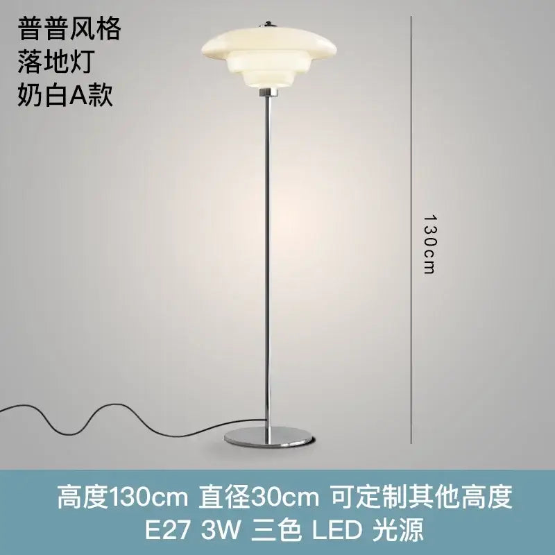 A sleek 130cm tall floor lamp with polished chrome stand and decorbites cream glass bauhaus shade for living room lighting