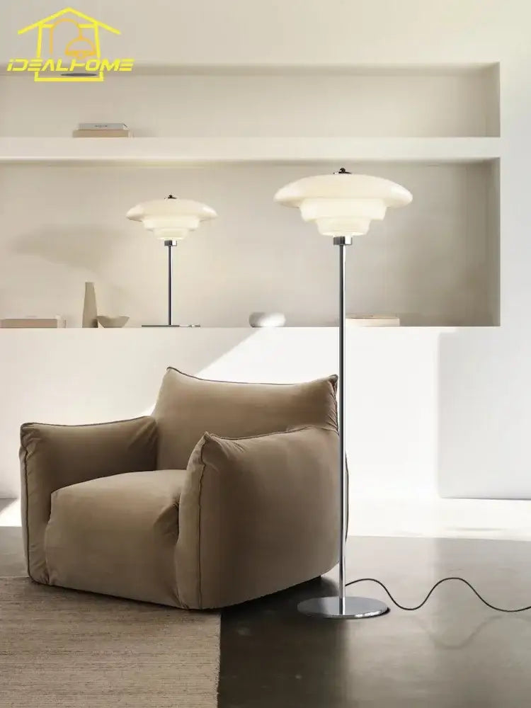 Modern bauhaus cream glass floor lamp with sleek chrome stand and layered translucent shades for living room decorbites cream glass