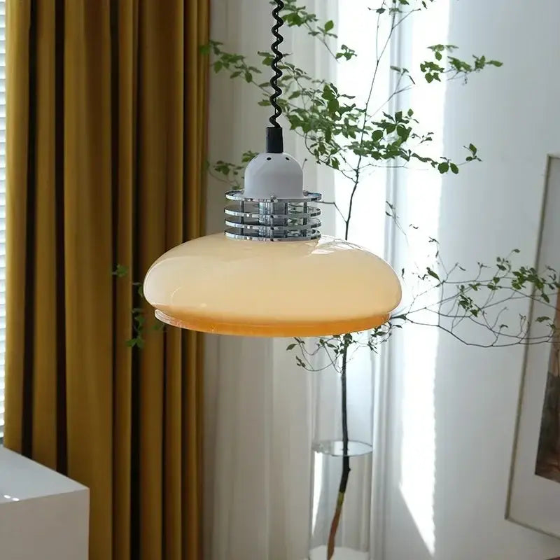 Modern bauhaus cream glass led chandelier featuring a warm amber glass led pendant light with chrome collar and black cord