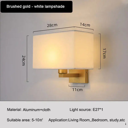 Brushed gold wall lamp with rectangular white lampshade for elegant beige and black bedroom wall lamp use