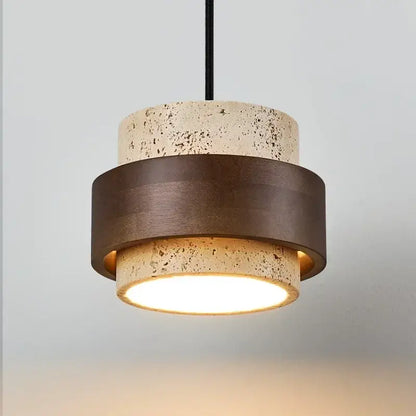 Modern pendant light with textured beige concrete and dark bronze ring, ideal for walnut wood finish dining room