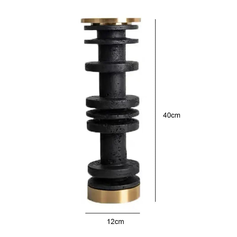 Modern beige and brown travertine candle holder with metal base featuring a black cast iron pillar with brass caps decorbites beige brown