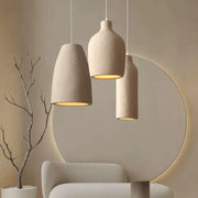 Modern beige cement led chandelier bedroom pendant light with three textured decorbites cement led lights glowing warmly