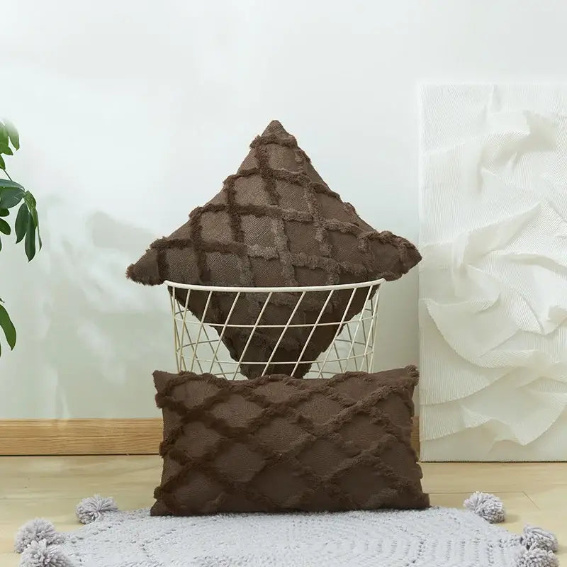Brown textured throw pillows with diamond solid embroidery cushion cover and frayed edges in wire basket for living room