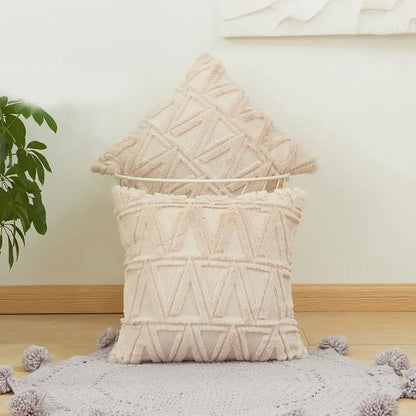 Cream-colored textured cushion cover with modern beige diamond solid embroidery and fringed edges for living room decor
