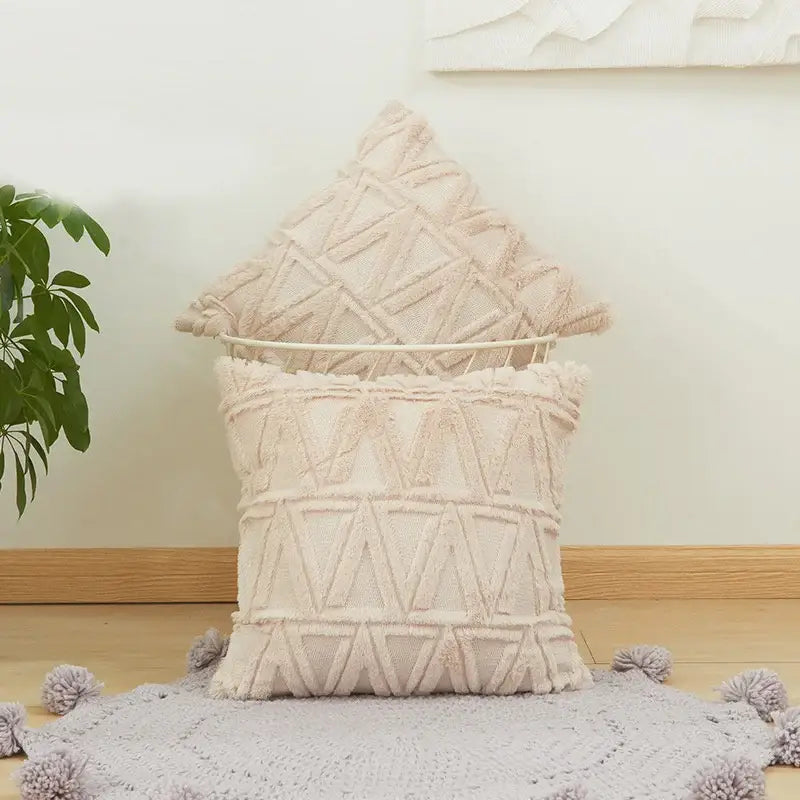 Cream-colored textured cushion cover with modern beige diamond solid embroidery and fringed edges for living room decor