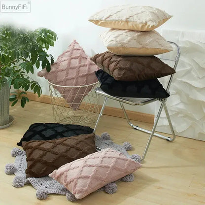 Stack of modern beige diamond solid embroidery cushion covers in soft pink beige brown and black for living room use