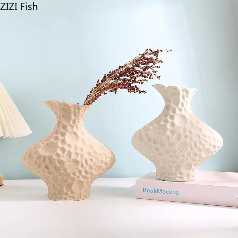 Cream-colored decorbites frosted ceramic vases with textured hammered surface and flared necks for living room decor