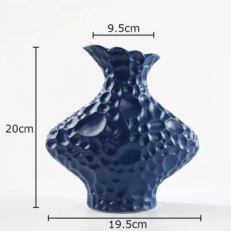 Deep blue frosted ceramic vase with textured bubble surface and flared rim for modern living room decorbites decor
