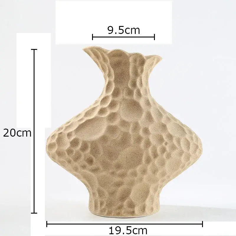 Modern beige frosted ceramic vase with a textured hammered surface and flared neck for living room decorbites frosted decor