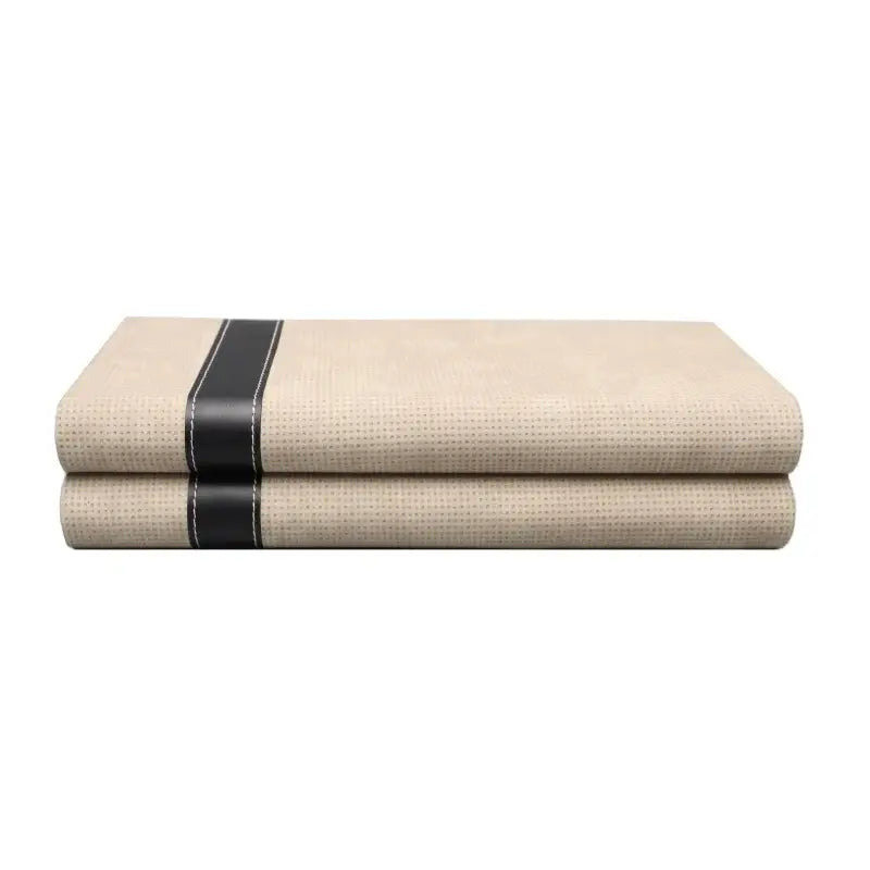 Modern beige geometric jewelry storage box features beige textured fabric with black leather strip and white stitching for jewelry storage