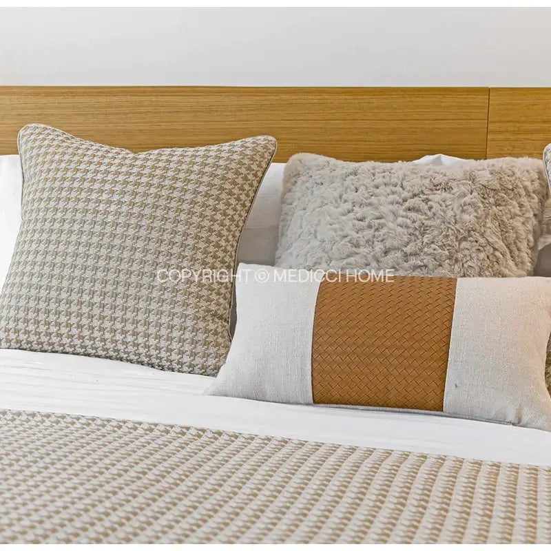 Beige gold houndstooth jacquard lumbar pillow with textured woven leather stripe for modern bedroom decorbites beige gold decor