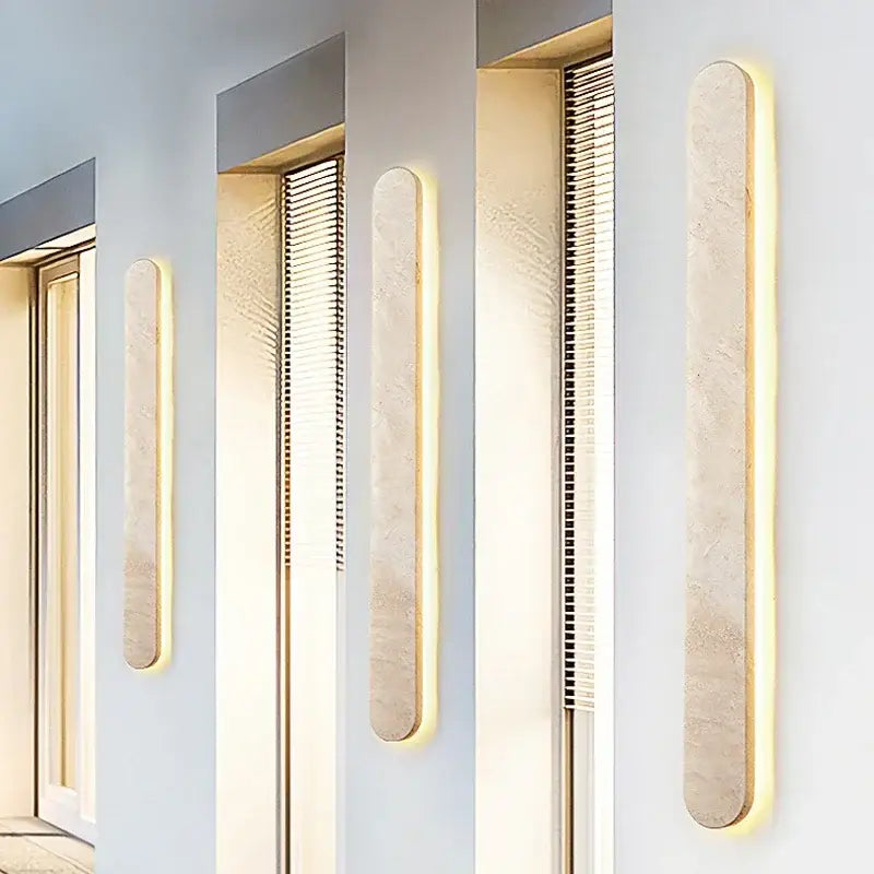 Modern beige marble courtyard led wall sconce with warm glowing led lighting and textured stone-like panels decorbites courtyard led wall decor